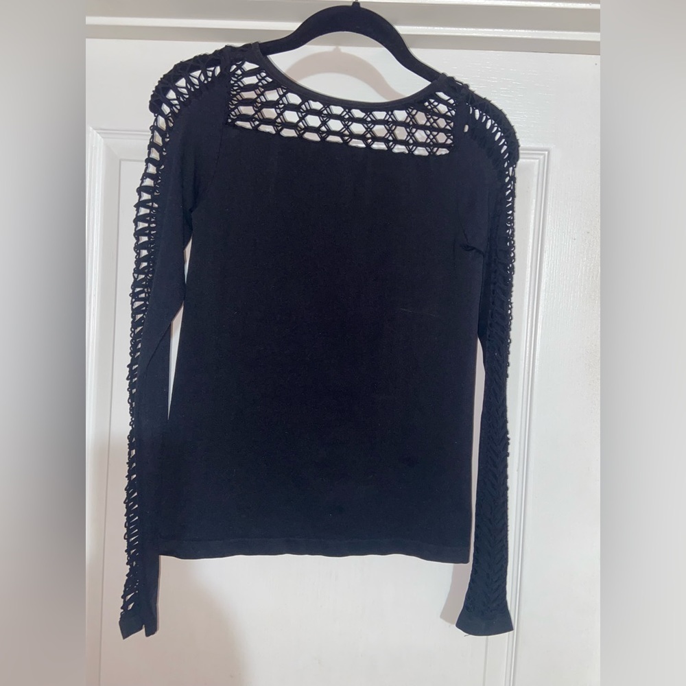 NWT Bebe woman’s shirt sz m/l.